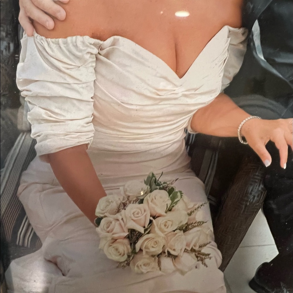 Custom alter motor couture gown can be worn as wedding dress as seen in photo